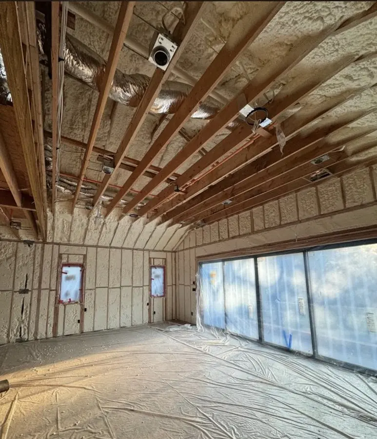 Interior walls and ceiling insulated with spray foam during new construction in Minooka